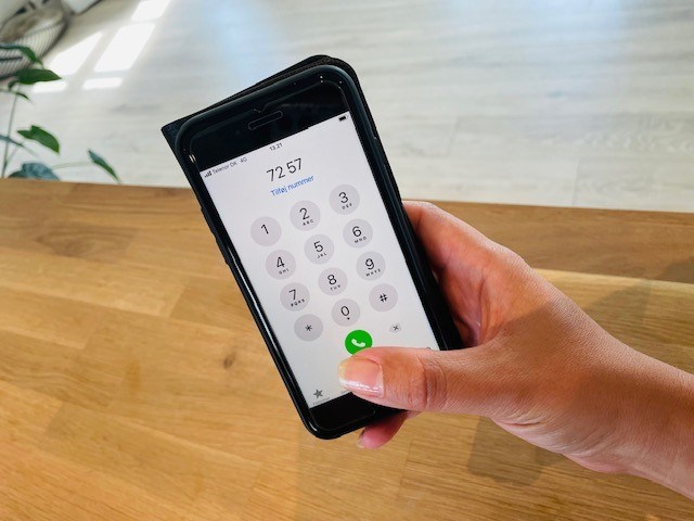 telefon i hånd 7257 tastet